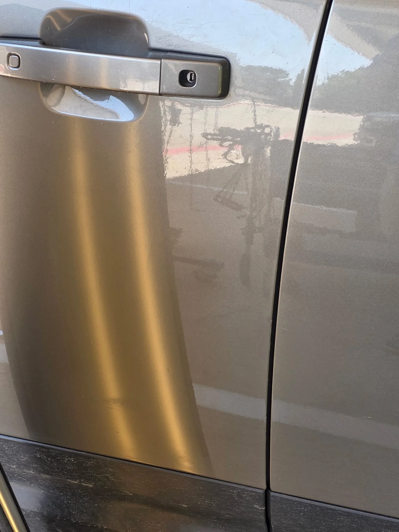 Silver SUV Dent Repair after PDR